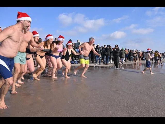 Coney Island Polar Bear Plunge into Cold Waters of Atlantic Ocean New York City Brooklyn Jan 1, 2024 thumbnail