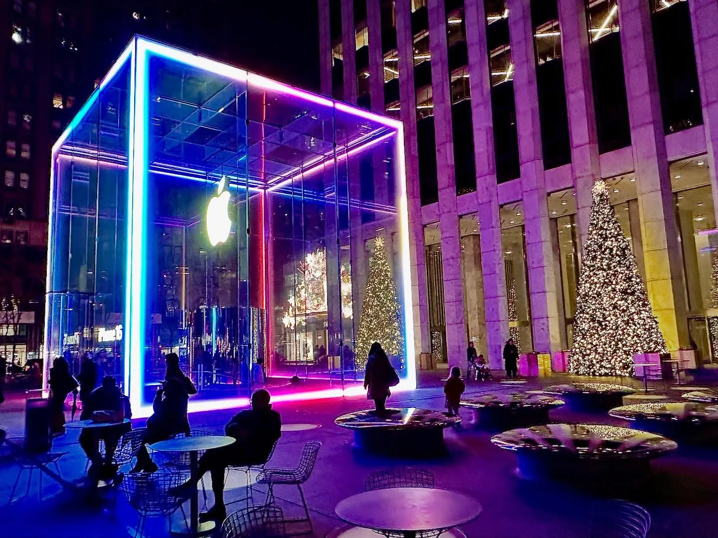 💜 The Apple Store on Fifth Avenue is a holiday wonder with violet lights and a beautiful Christmas tree! Instagram preview
