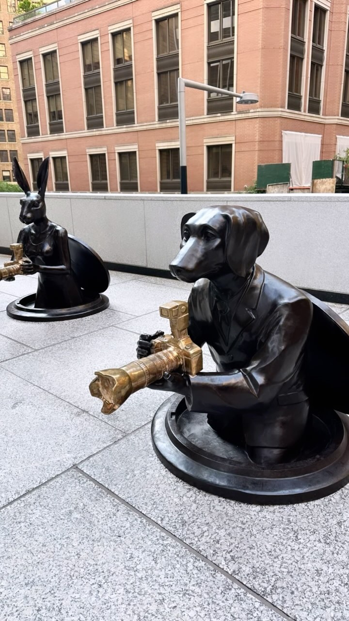 🐶 🐰 “Watch out for Paparazzi Dog / Rabbit” is a bronze installation at 28 Liberty Street #NYC #PaparazziDogmanRabbitwoman #SewerInstallation #GillieandMarc @28libertystreet @gillieandmarcartists Instagram preview