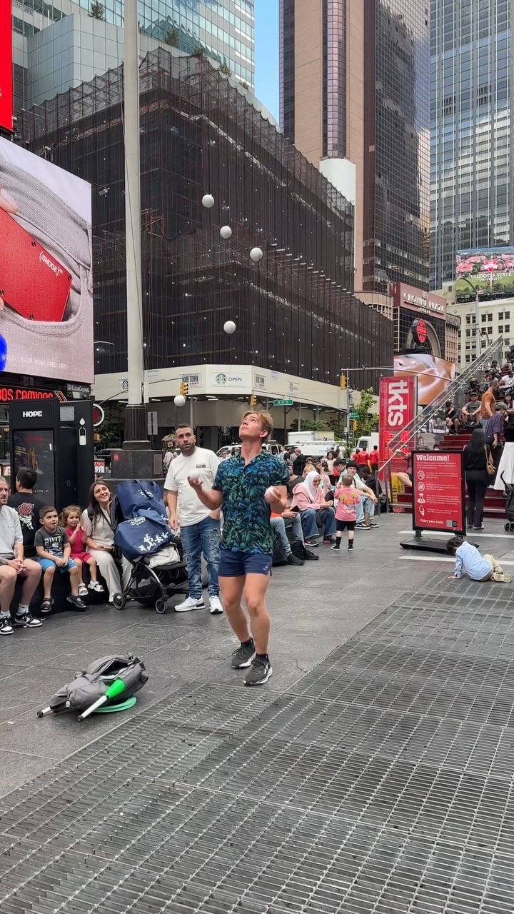 🎪✨ A juggler is showing off his skills @timessquarenyc Instagram preview