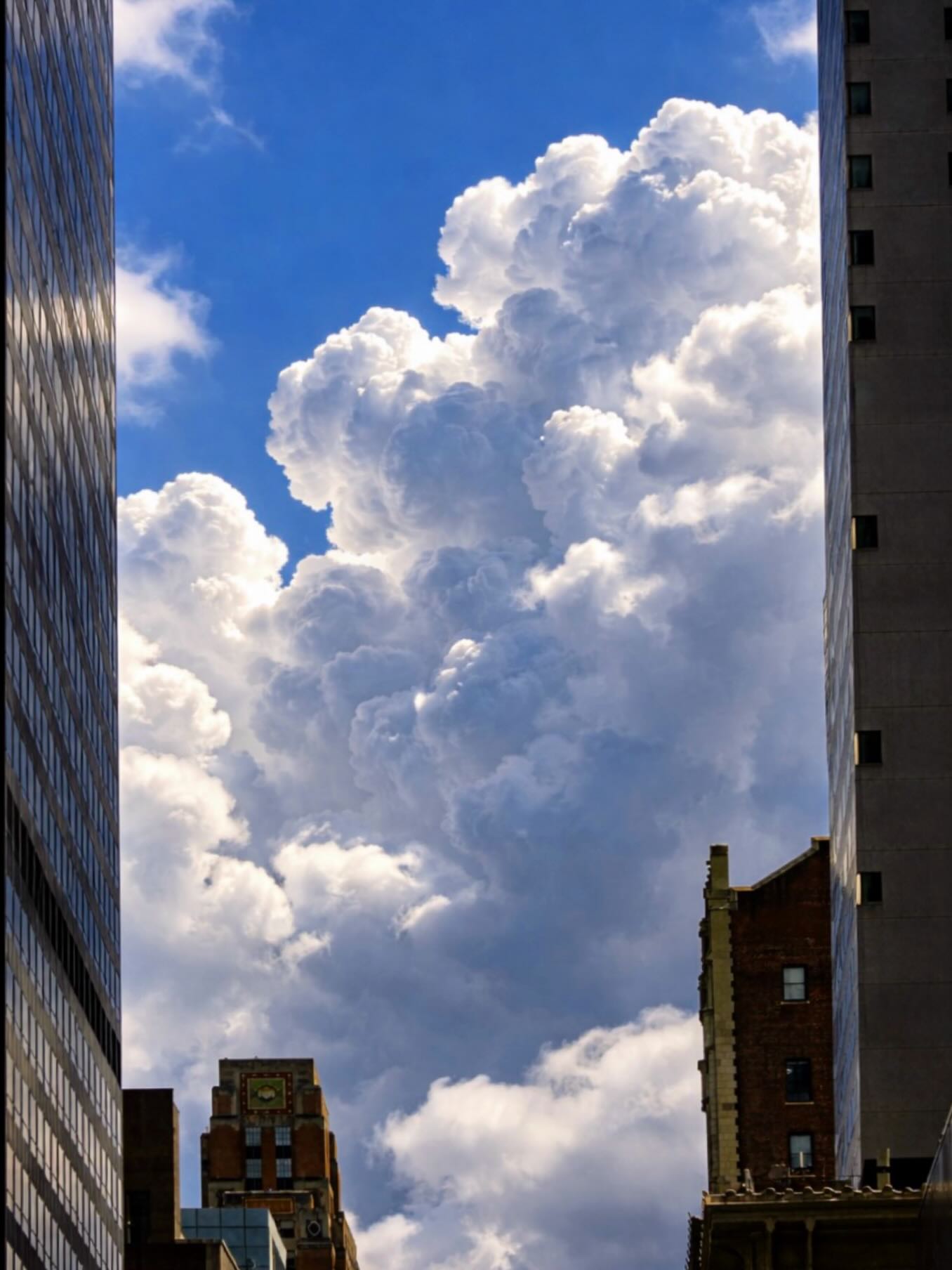 Cumulonimbus clouds rising over Midtown #cloud #sky #photography #manhattan #nyc Instagram preview