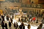 Light flows into Grand Central Terminal as commuters pass by